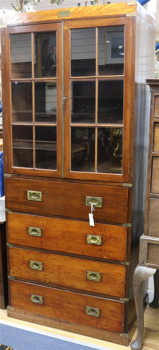 A brass mounted mahogany campaign style secretaire bookcase, W.81cm H.191cm